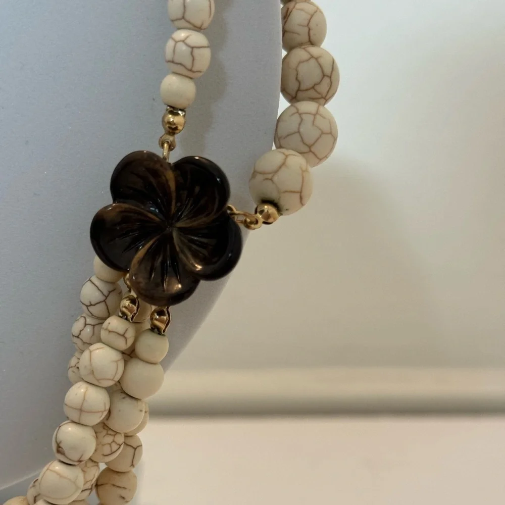 Gorgeous earth tone beaded necklace with brown floral accents